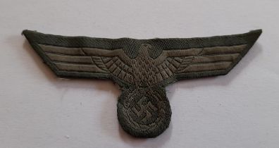 WW11 German, Wehrmacht embroidered cloth tunic badge FROM DUXFORD AVIATION