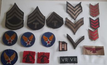 WW11 USA and British army patches, mainly removed from uniforms.