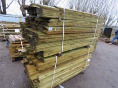2 X LARGE PACKS OF TREATED FEATHER EDGE TIMBER: 1.6 -1.9M LENGTH APPROX @ 100MM WIDTH APPROX.