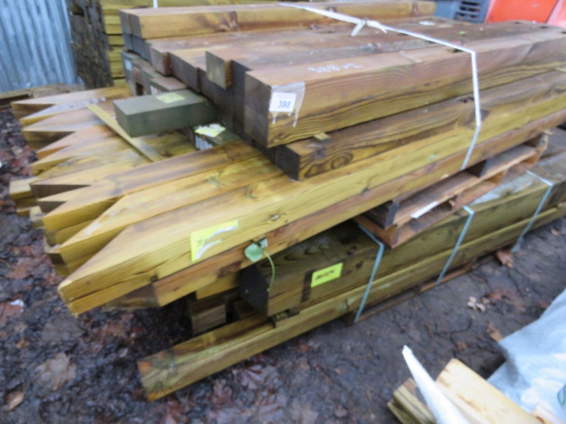 2 X PALLETS OF ASSORTED TREATED TIMBER FENCING POSTS ETC.