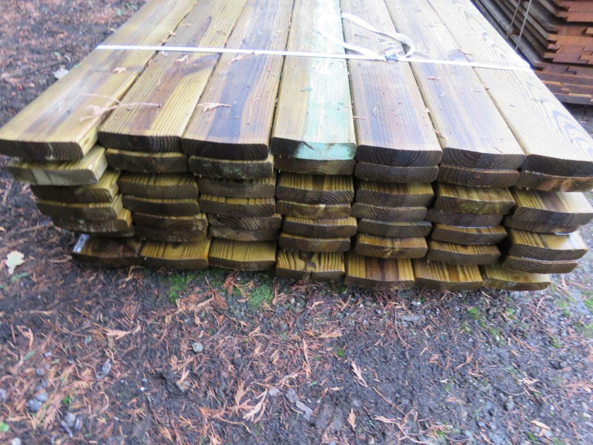 STACK OF 49NO TIMBER TREATED FENCE RAILS, 3.2M LENGTH 150MM X 35MM APPROX. - Image 2 of 4