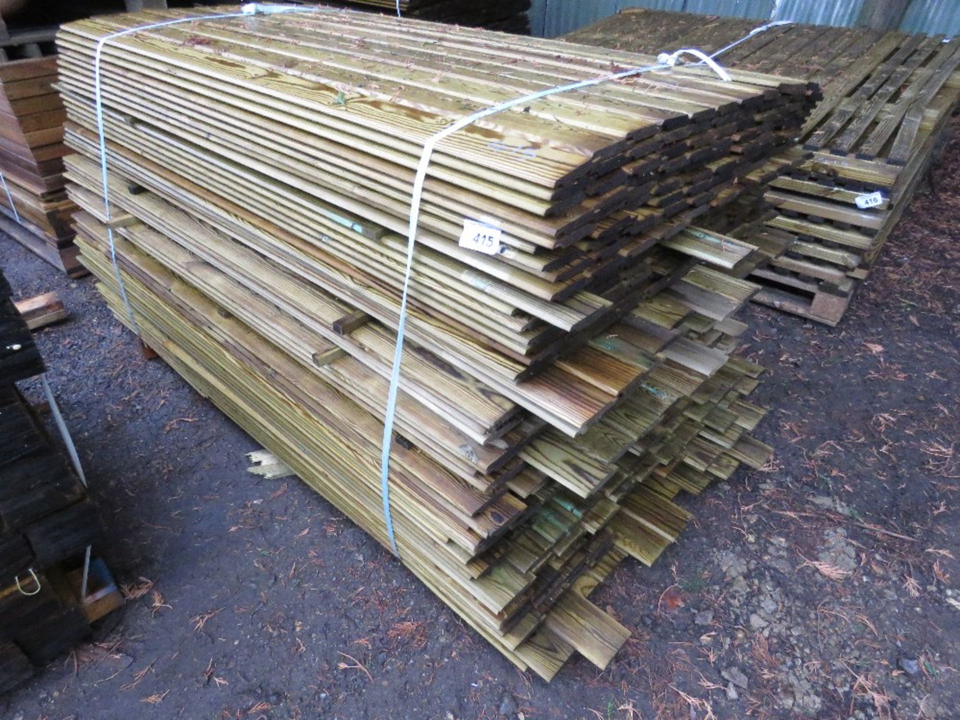 1X LARGE PACKS OF TREATED FEATHER EDGE TIMBER: MAINLY 1.83M LENGTH APPROX @ 100MM WIDTH APPROX.