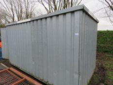 LIGHTWEIGHT METAL STORAGE CONTAINER SHED WITH KEY, ON STEEL RUNNERS. 13FT LENGTH APPROX.