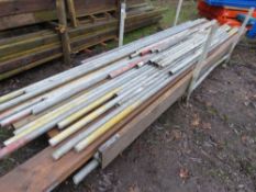 STILLAGE CONTAINING STEEL SCAFFOLD TUBES PLUS SOME BOARDS. THIS LOT IS SOLD UNDER THE AUCTIONEERS