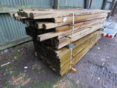 2 X LARGE PACKS OF TREATED TIMBER POSTS: 2.4-2.7M LENGTH APPROX, 55MM X 45MM AND ALSO 55MM X 45MM SI