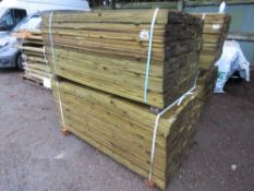 2 X LARGE PACKS OF TREATED FEATHER EDGE TIMBER: 1.5 AND 1.65M LENGTH APPROX @ 100MM WIDTH APPROX.