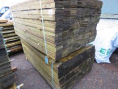 2 X LARGE PACKS OF TREATED FEATHER EDGE TIMBER: 1.8M LENGTH APPROX @ 100MM WIDTH APPROX.