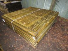 STACK OF 12 X ASSORTED WOODEN FENCE PANELS.