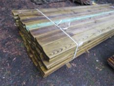 STACK OF 49NO TIMBER TREATED FENCE RAILS, 3.2M LENGTH 150MM X 35MM APPROX.