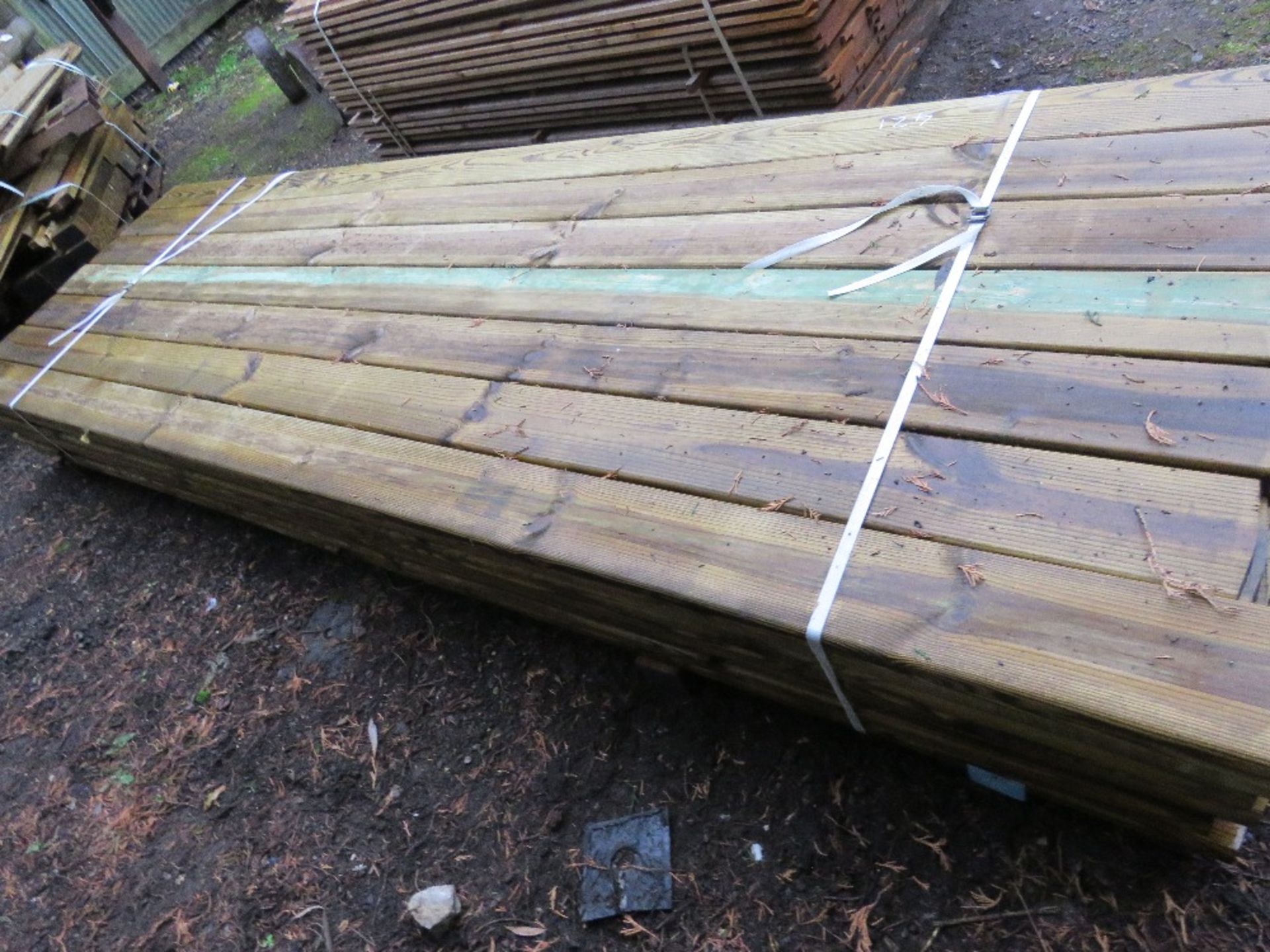 STACK OF 49NO TIMBER TREATED FENCE RAILS, 3.2M LENGTH 150MM X 35MM APPROX. - Image 4 of 4