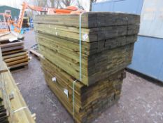 2 X LARGE PACKS OF TREATED FEATHER EDGE TIMBER: 1.5M LENGTH APPROX @ 100MM WIDTH APPROX.
