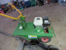 PETROL ENGINED TURF CUTTER. WHEN TESTED WAS SEEN TO RUN AND BLADE RECIPROCATED. THIS LOT IS SOLD