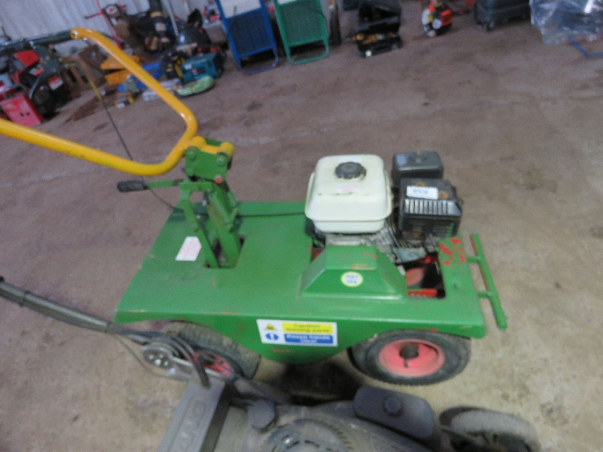 PETROL ENGINED TURF CUTTER. WHEN TESTED WAS SEEN TO RUN AND BLADE RECIPROCATED. THIS LOT IS SOLD