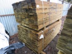 2 X PACKS OF TREATED FEATHER EDGE TIMBER CLADDING BOARDS 1.8M LENGTH X 100MM WIDTH APPROX.