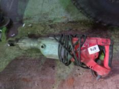 MILWAUKEE HEAVY DUTY 110VOLT POWERED BREAKER DRILL. THIS LOT IS SOLD UNDER THE AUCTIONEERS MARGIN