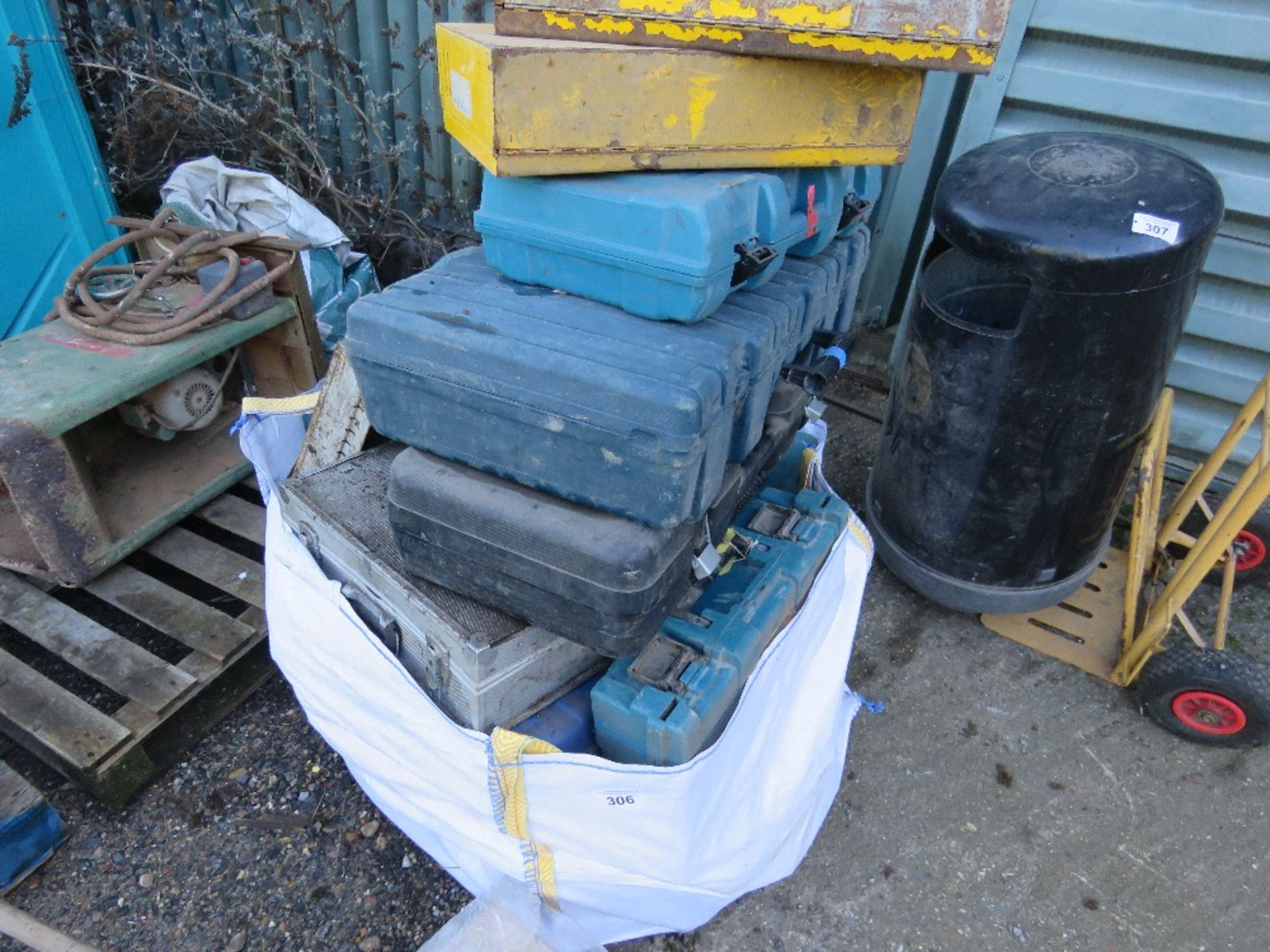 BULK BAG OF POWER TOOL BOXES, EMPTY.