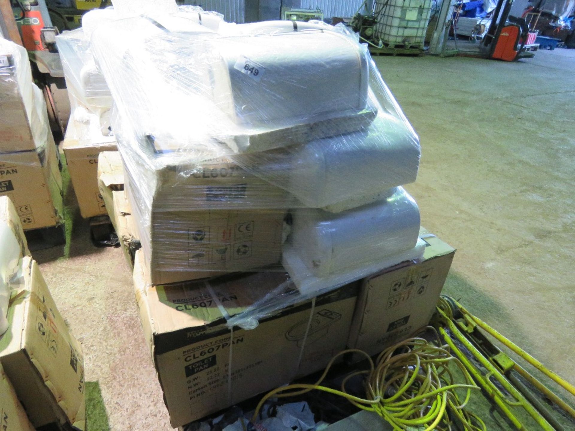 PALLET CONTAINING 7 X TOILET PANS WITH CISTERNS. SURPLUS TO DEVELOPMENT PROJECT.