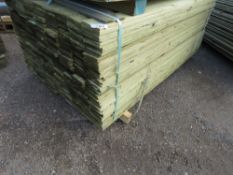 LARGE PACK OF FEATHER EDGE PRESSURE TREATED TIMBER CLADDING BOARDS. 1.8M LENGTH X 100MM WIDTH APPRO