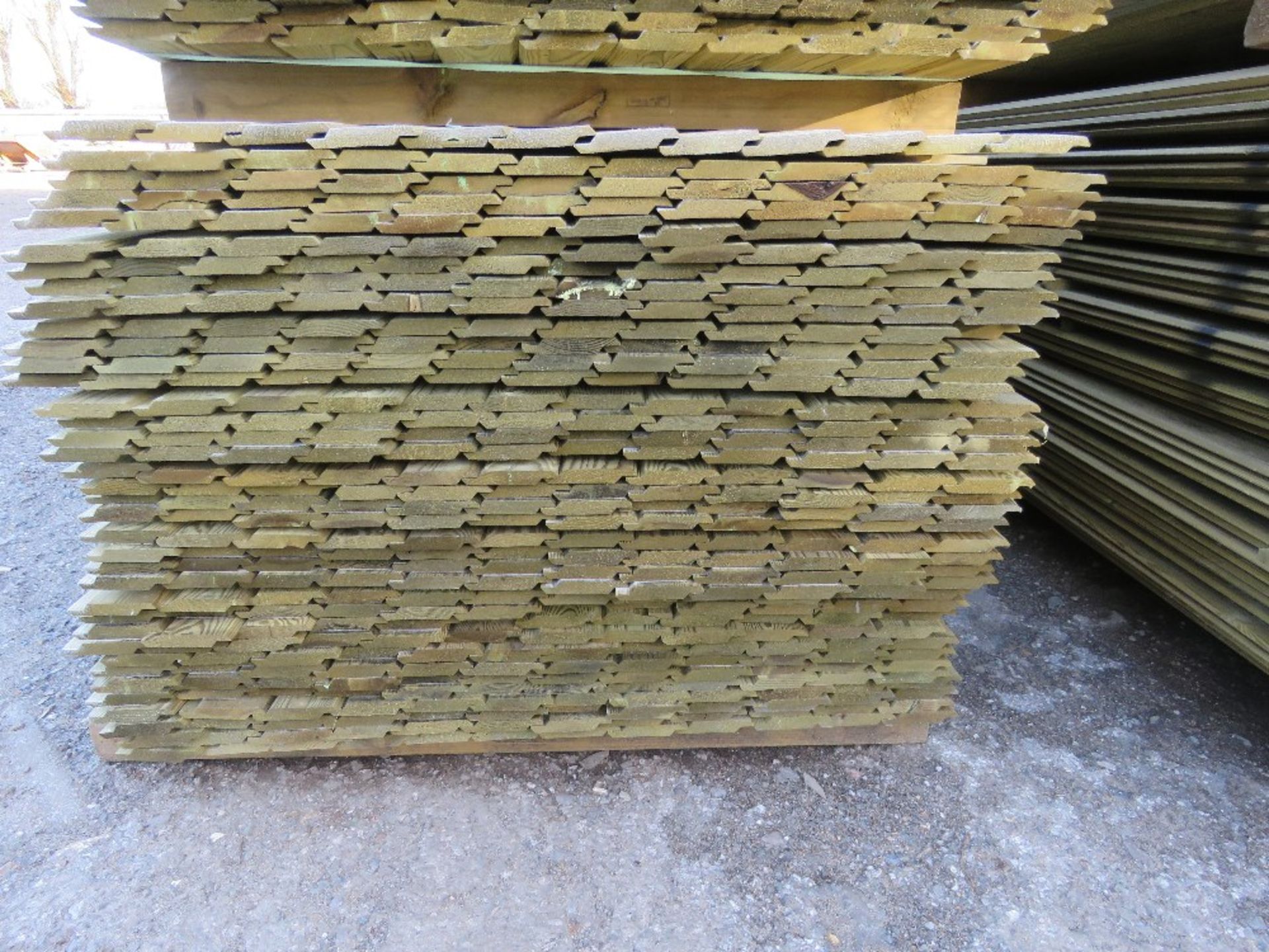 LARGE PACK OF PRESSURE TREATED SHIPLAP FENCE CLADDING BOARDS. 1.73M LENGTH X 100MM WIDTH APPROX. - Image 2 of 3