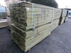 2 X LARGE PACKS OF PRESSURE TREATED HIT AND MISS TYPE FENCE CLADDING BOARDS. 1.74M LENGTH X 100MM WI
