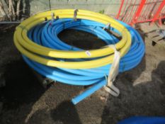 3 X ROLLS OF 63MM AND 50MM PIPING. THIS LOT IS SOLD UNDER THE AUCTIONEERS MARGIN SCHEME, THEREFOR