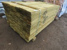 LARGE PACK OF PRESSURE TREATED FEATHER EDGE TIMBER CLADDING 1.8M LENGTH X 100MM WIDTH APPROX.