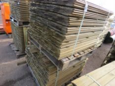 2 X PALLETS OF SHIPLAP PRESSURE TREATED CLADDING BOARDS. 1.1M LENGTH X 100MM WIDTH APPROX.
