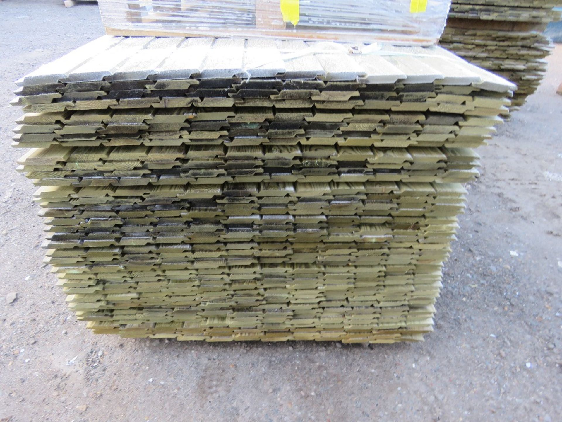 LARGE PACK OF PRESSURE TREATED SHIPLAP FENCE CLADDING BOARDS. 1.73M LENGTH X 100MM WIDTH APPROX. - Image 2 of 3