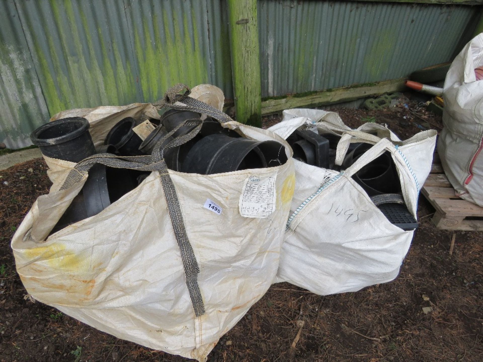 2 X BULK BAGS CONTAINING ASSORTED BLACK PLASTIC DRAINAGE AND MANHOLE FITTINGS . DIRECT FROM COMPANY