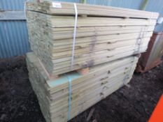 2 X LARGE PACKS OF TREATED HIT AND MISS TIMBER CLADDING BOARDS 1.75M LENGTH X 100MM WIDTH APPROX.