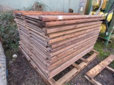 STACK OF APPROXIMATELY 28NO FEATHER EDGE FENCE PANELS 1.83M X 1.5M APPROX. THIS LOT IS SOLD UNDER