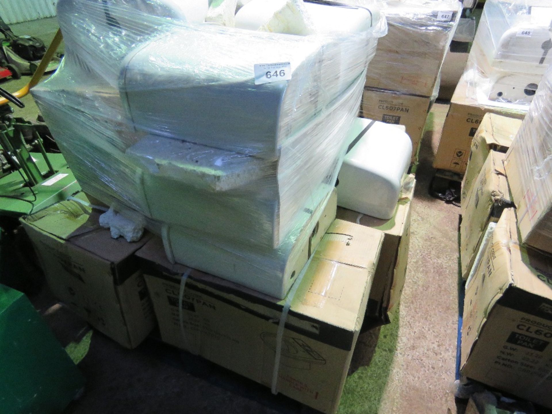 PALLET CONTAINING 7 X TOILET PANS WITH CISTERNS. SURPLUS TO DEVELOPMENT PROJECT.