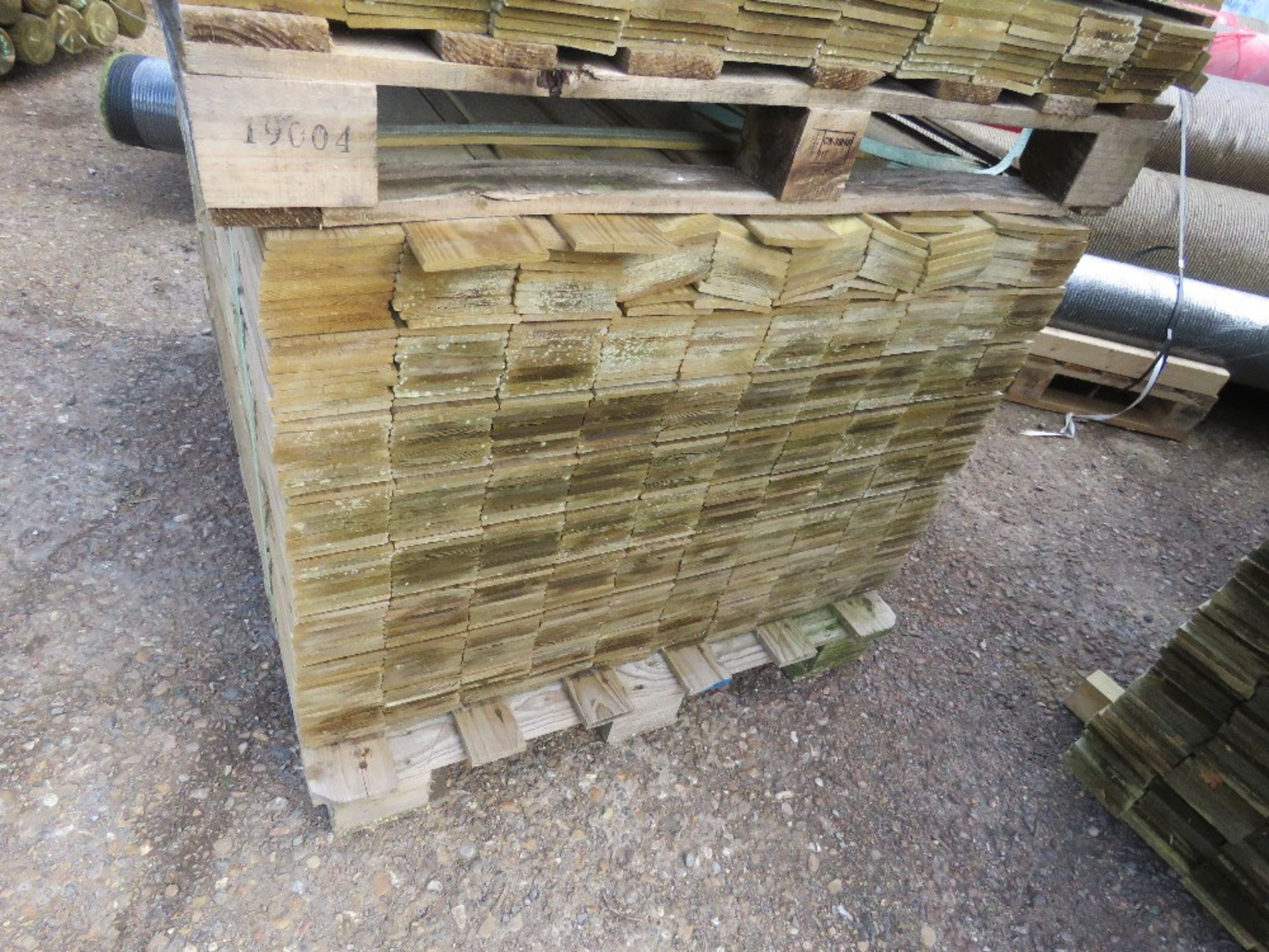 2 X PACKS OF TREATED HIT AND MISS CLADDING BOARDS 114CM LENGTH X 100MM WIDTH APPROX. - Image 3 of 4