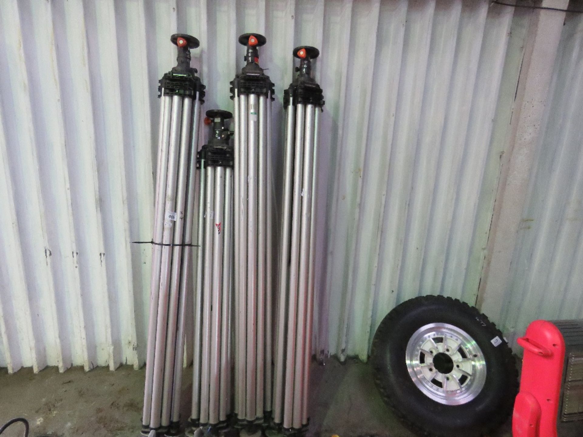 4 X EXTRA LARGE SURVEY TRIPOD UNITS.