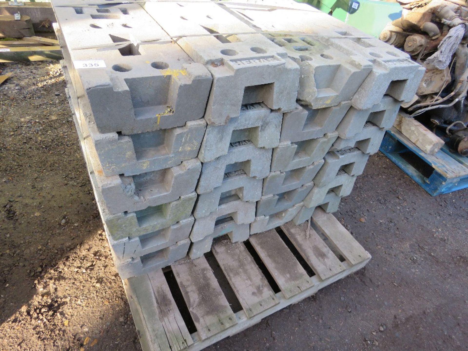 PALLET OF HERAS TYPE TEMPORARY FENCE BLOCKS/BASES. THIS LOT IS SOLD UNDER THE AUCTIONEERS MARGIN