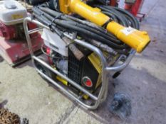 ATLAS COPCO HYDRAULIC BREAKER PACK WITH HOSE AND GUN.