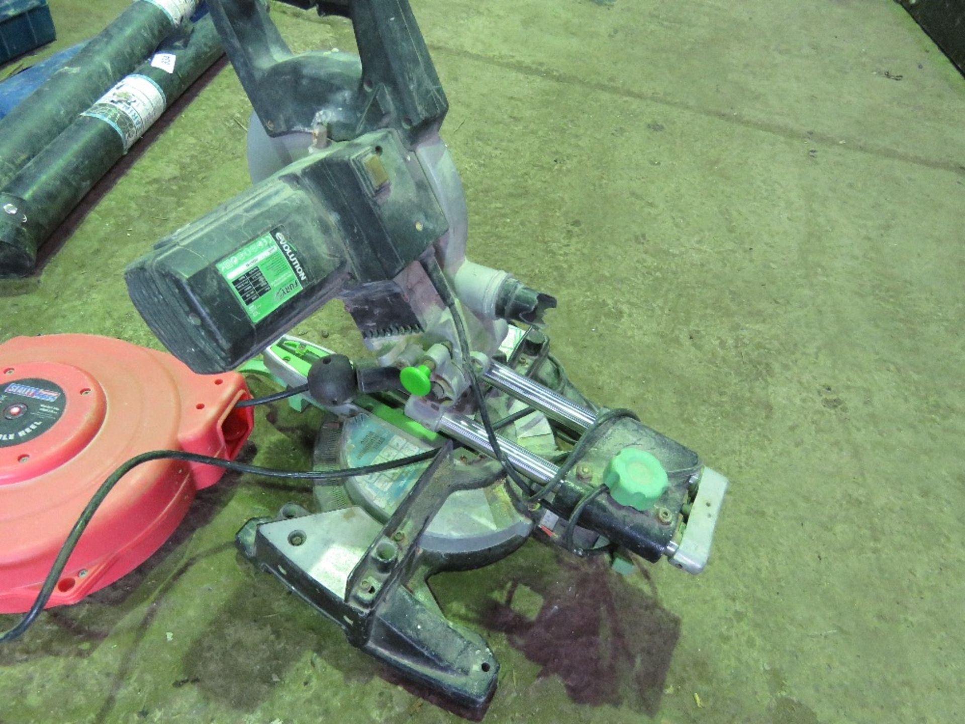 EVOLUTION 240VOLT MITRE SAW PLUS A RETRACTABLE CABLE REEL. COMPANY LIQUIDATION STOCK. THIS LOT IS - Image 2 of 4