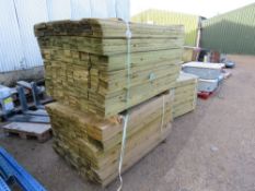 2 X PACKS OF TREATED FEATHER EDGE CLADDING BOARDS: 1.35M LENGTH X 100MM WIDTH APPROX.