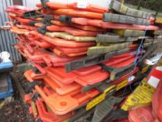 STACK OF APPROXIMATELY 30NO CHAPTER 8 PLASTIC ROAD BARRIERS.