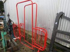 2 X RED METAL CROWD BARRIER GATES. THIS LOT IS SOLD UNDER THE AUCTIONEERS MARGIN SCHEME, THEREFOR