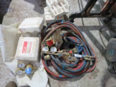 GAS CUTTING HOSES, GUAGES AND A GUN. THIS LOT IS SOLD UNDER THE AUCTIONEERS MARGIN SCHEME, THEREF