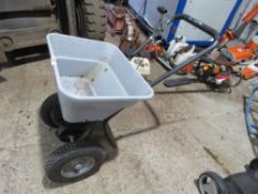 HANDY SALT SPREADING BARROW. THIS LOT IS SOLD UNDER THE AUCTIONEERS MARGIN SCHEME, THEREFORE NO V