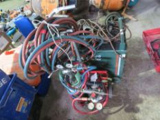 MINI GAS WELDING TROLLEY WITH GUN, HOSES AND GUAGES. THIS LOT IS SOLD UNDER THE AUCTIONEERS MARGI