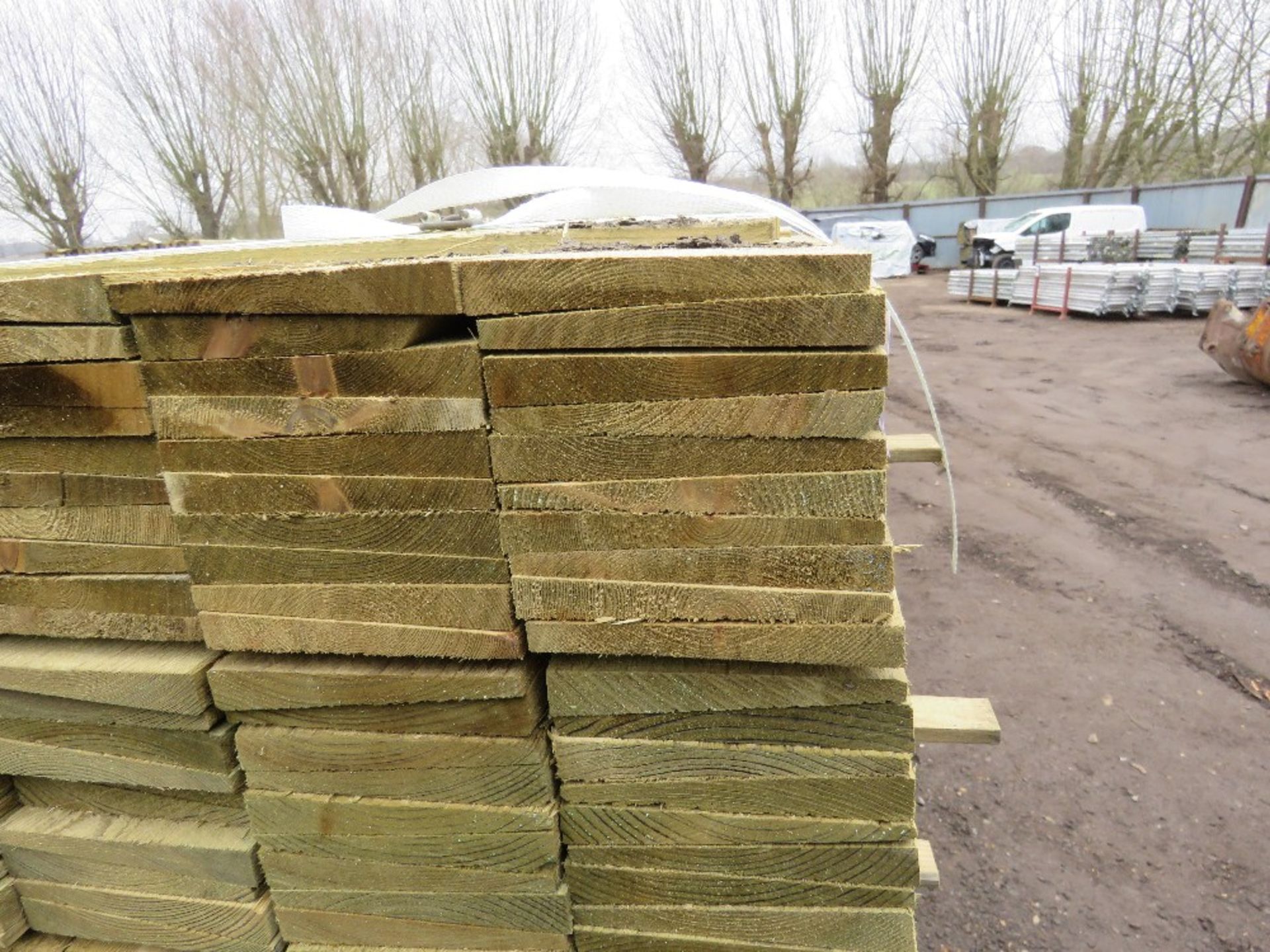 PACK OF PRESSURE TREATED FEATHER EDGE TIMBER CLADDING BOARDS: 1.2M LENGTH X 100MM WIDTH APPROX. - Image 3 of 4