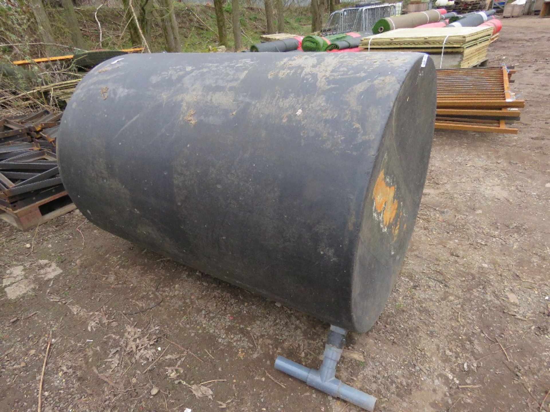 LARGE BLACK PLASTIC WATER TANK.