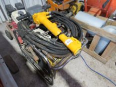 ATLAS COPCO HYDRAULIC BREAKER PACK WITH HOSE AND GUN.