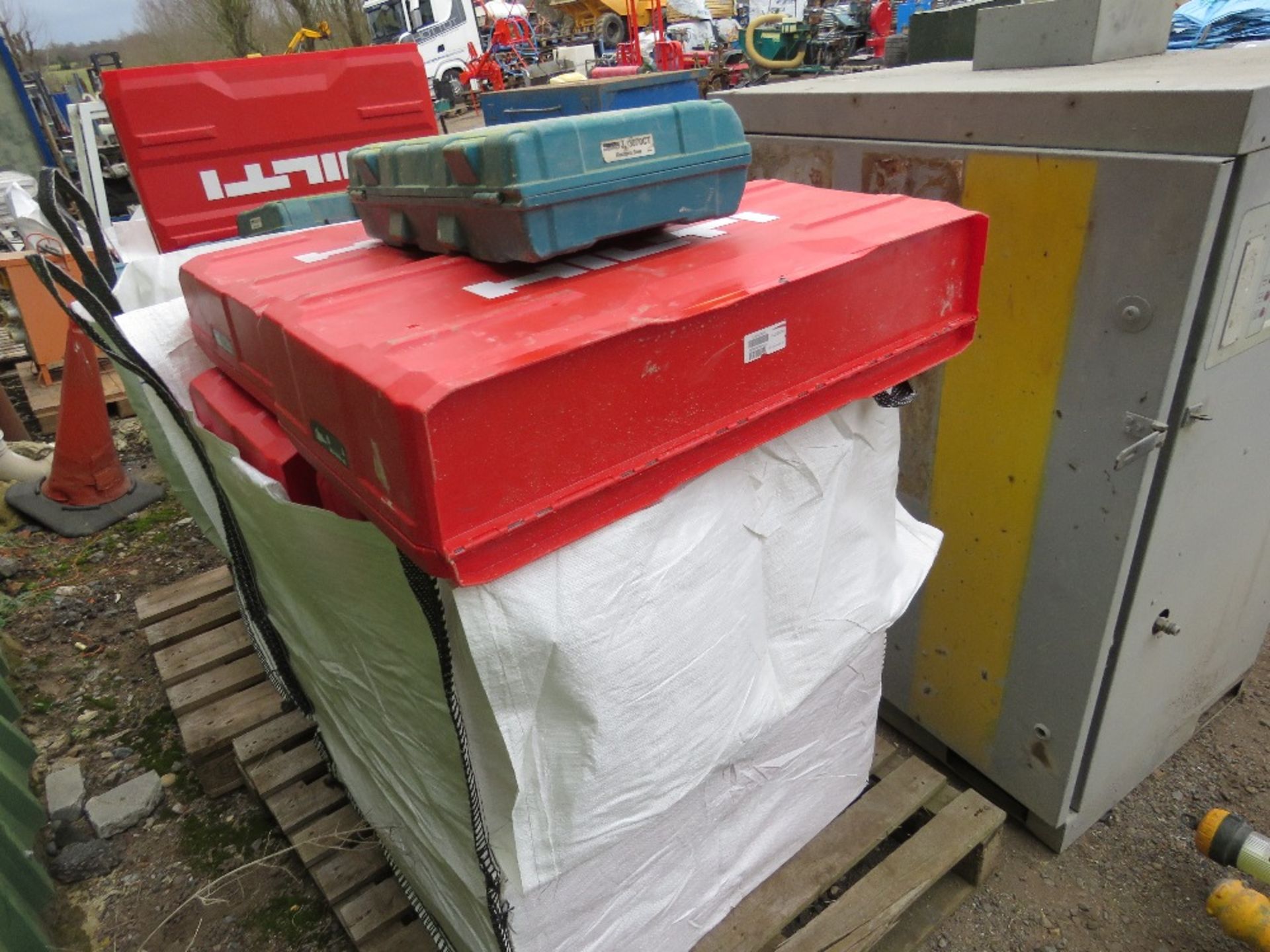 BULK BAG CONTAINING MAINLY HILTI POWER TOOL CASES.