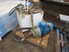 LARGE ELECTRIC MOTOR WITH HYDRAULIC PUMP AND OIL RESERVOIR TANK. THIS LOT IS SOLD UNDER THE AUCTI