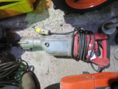 MILWAUKEE HEAVY DUTY 110VOLT POWERED BREAKER DRILL. THIS LOT IS SOLD UNDER THE AUCTIONEERS MARGIN