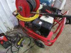 HONDA ENGINED POWER WASHER WITH HOSE AND LANCES. WHEN TESTED WAS SEEN TO RUN (REQUIRES RECOIL, START